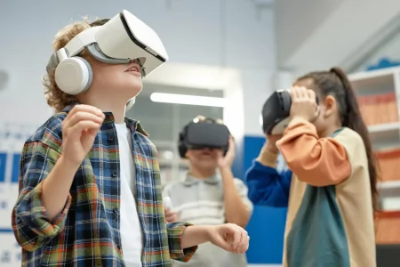 children using vr headsets in class