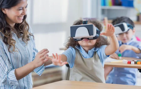 teacher with kids wearing VR