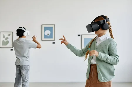 two kids using VR